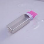 أداه توزيع الماسك و حمام الزيت